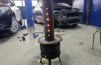 Ağrı'da kaporta ustaları yağ sobasıyla kışa çözüm buldu