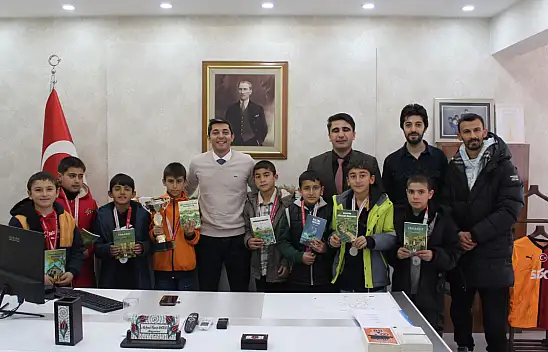 Hamur'un şampiyon sporcularından Kaymakam ziyareti