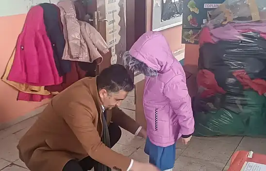 Toklucak ve Budak'ta çocukları ısıtan yardım