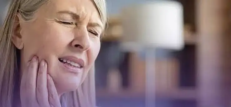 Çene ekleminden gelen sese ağrı ve kilitlenme eşlik ediyorsa dikkat
