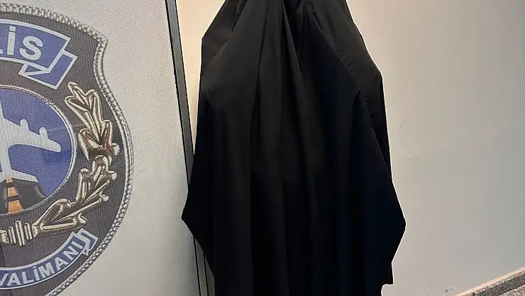 Kars'ta suç makinesi kadın kılığında yakalandı